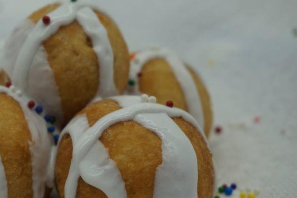 Fried dough with vanilla icing.