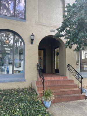 Our Offices are located through these doors to the left at the top of the stairs!