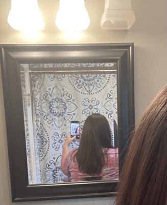 Shows length of hair. This is after I added the anti-frizz products.