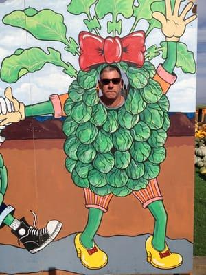 My husband the broccoli & not too happy about it