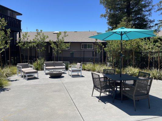 Pool, fire pit, and grill area