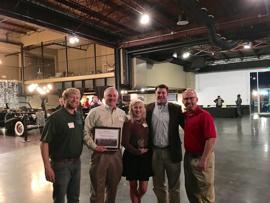 AK Heating and Air won two awards this year from Alabama Power. Arlie and Kristi are pictured with support team outside the company