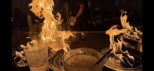 The chef lit every plate on fire with his hand!