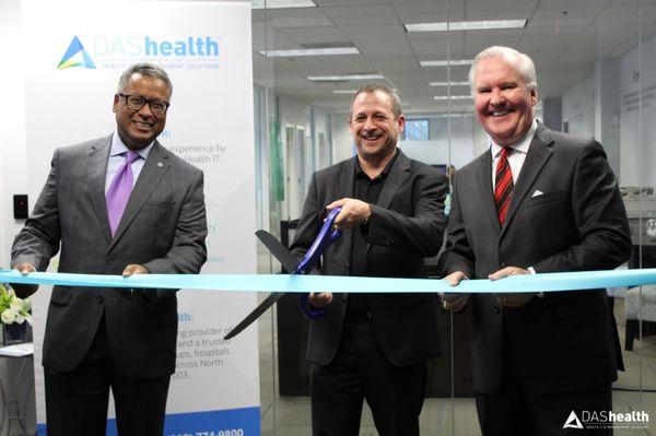 CEO David Schlaifer, pictured with Mayor Bob Buckhorn and Craig Richards of the Tampa EDC, cuts the ribbon on our office space.