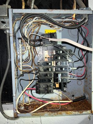 Water entry into an electrical panel.  Hazard.