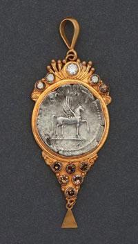 ancient silver coin in 22kt with fancy natural coloredndiamonds