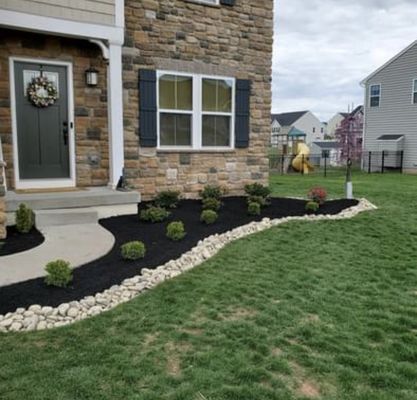 Spring cleanup with mulch installation