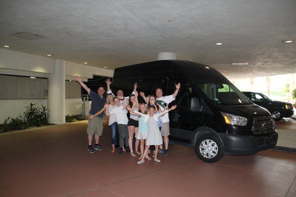 A van big enough for a group of eight plus luggage.