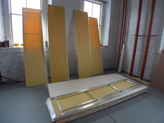 Aluminum frames with fiberglass panels glued in