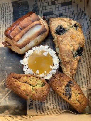 Bacon and Gouda croissant, maple blueberry scone, black sesame matcha financiers, and passionfruit tart