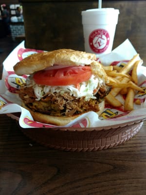 The Shaniac! Cheese burger w/pulled pork and slaw. Addes onion and tomato. Fantastic!