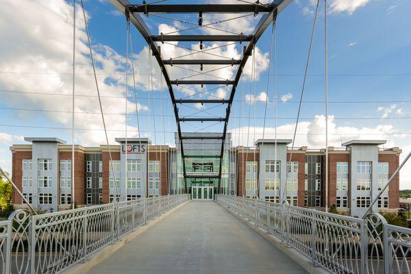 Pedestrian bridge connecting the Lofts at Mercer Landing with Mercer University, across Mercer University Drive.