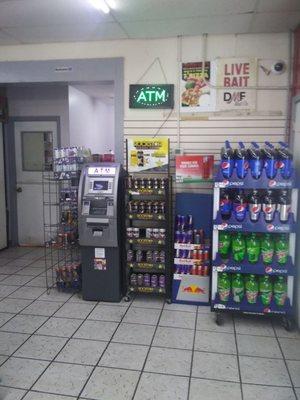 The ATM is located in the back by the restrooms