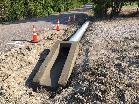 18" metal culvert with concrete safety ends installed in Princeton, Tx.