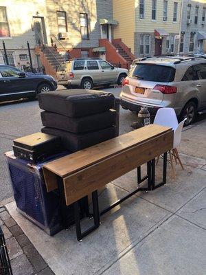 Furniture left unattended by the movers.