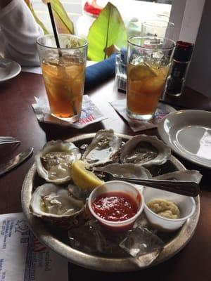 Long Island iced tea and oysters at happy hour