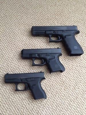 G21 Gen4 (top - 45 AUTO), G26 Gen4 (middle - 9x19), brand new (July 2014) made in Smyrna, Georgia, USA - G42 (bottom - .380).