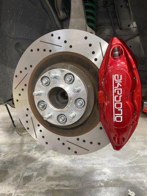 Powder coated calipers in Rancher Red with Chrome base. Beautiful.