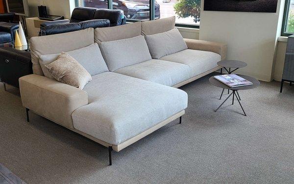 Italian sectional shown in combination of Nabuk leather and fabric. Many configurations and options available.