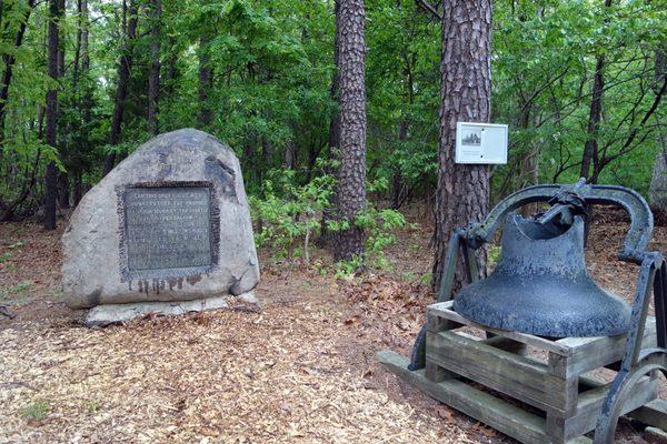 Historic marker commemorating the meeting of Thomas Potter & John Murray. Bell from church.