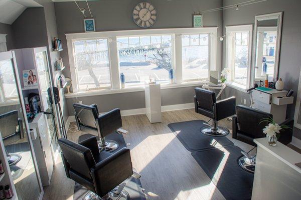 Our salon area has a view of the beach and Boston's skyline