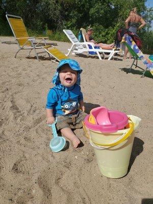 Caspian loves the sand beach!