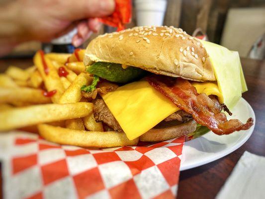 Avocado Cheeseburger with bacon.