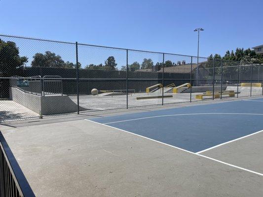 Skate park next to basketball court