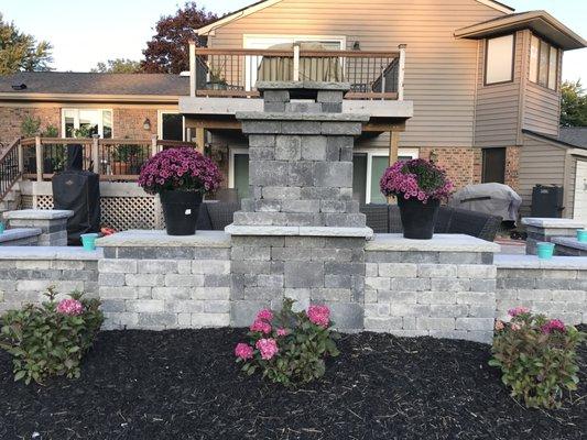 Fireplace patio Tumbled Unilock brick pavers, All Natural Landscapes, Brick Paver patio,