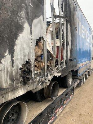 Trailer with our burned up property.