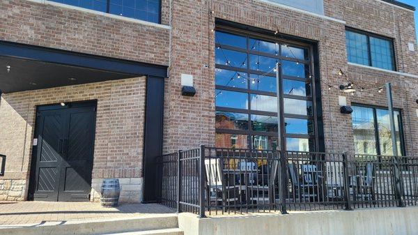 Entrance and one of the patios.