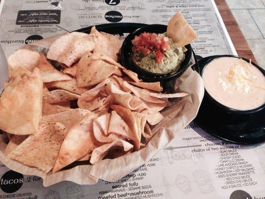 Chips, guacamole, and cheesy queso. Yum yum and yum.