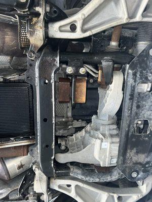 Fluid covered undercarriage of car