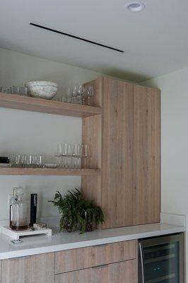 Linear diffuser above bar.