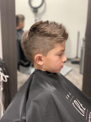 Kid's Mohawk haircut.