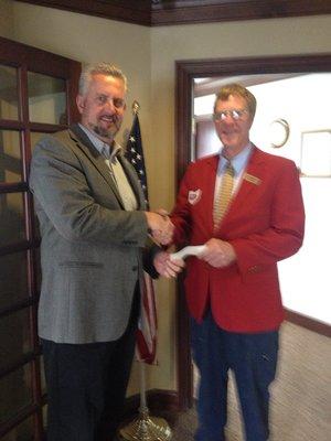 Co-owner Ron Schmitt meeting with state rep Mike Henne