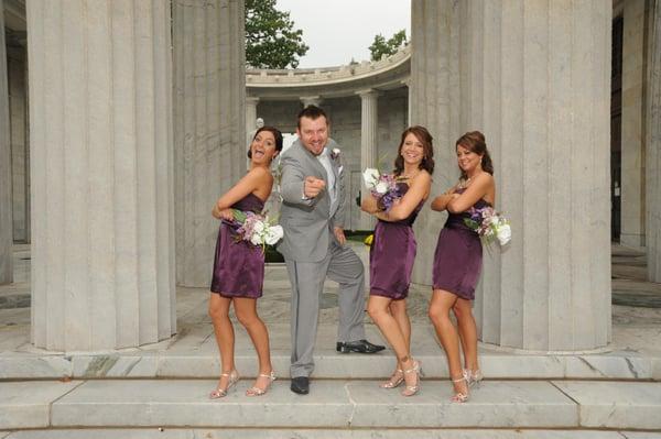 Groom gets the bridesmaids to enjoy having pictures with him!