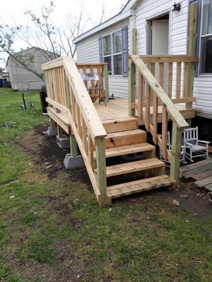 Deck we built, almost done after underpinning and a stain