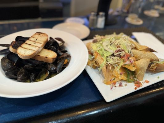 Cajun Mussels & nachos   Definitely try the Cajun style mussels! Both Excellent!