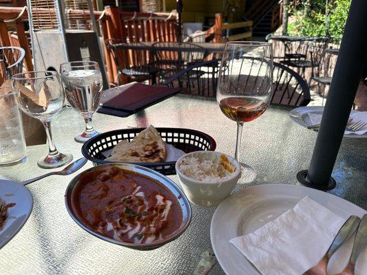 Butter chicken, Garlic Naan and a dry sparkling Rose!