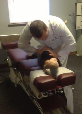 Dr. DeVreugd adjusting a 3 year old patient