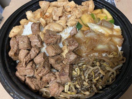 Chicken and Steak with steamed rice, bean sprouts, zucchini, onions and ginger sauce.