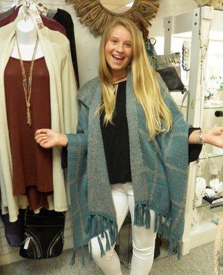 Madi looks perfect for the cool fall days in our favorite Noelle wraps! They even have a hood