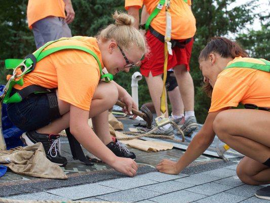 Some of our students doing home repairs during workcampNE.