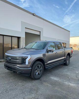 2022 Ford Lightning wrapped in Matte dark grey