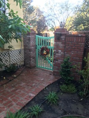 Brick and Wood Gate and Brick walkway