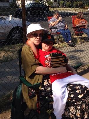 In the "dugout" with his grandma.