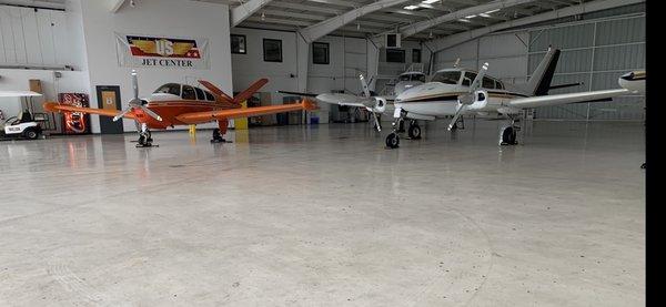 Storms forecasted for tonight so the line guys put my 3 planes in their community hangar! Good looking out guys!