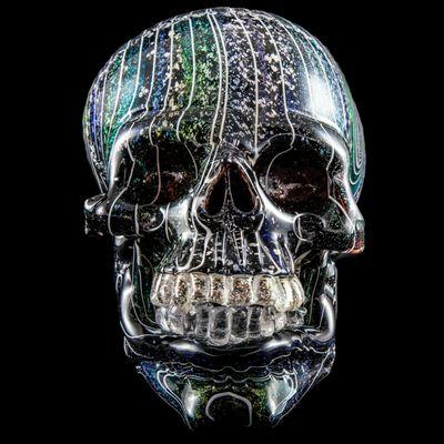 Hand blown glass Skullpture by Evan Schauss. Rainbow Dichro with silver, STUNNING!