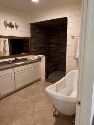 Really large bathroom with walk-in shower and separate soaker tub